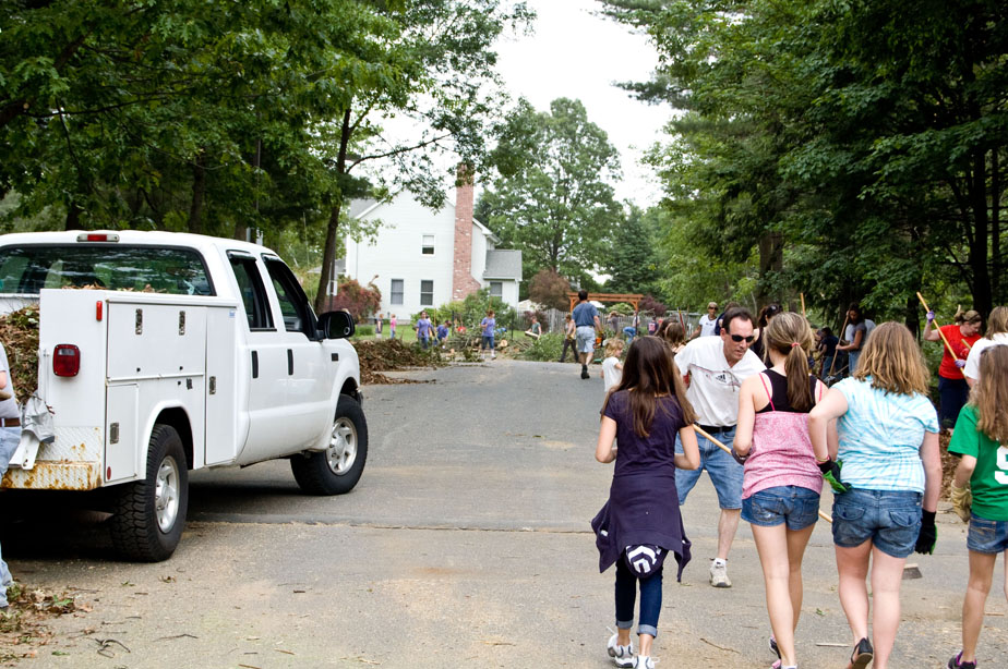 People cleaning up debris.