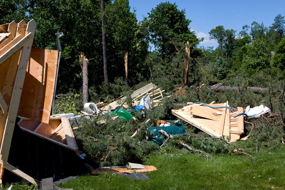 Outbuilding broken over lawn.